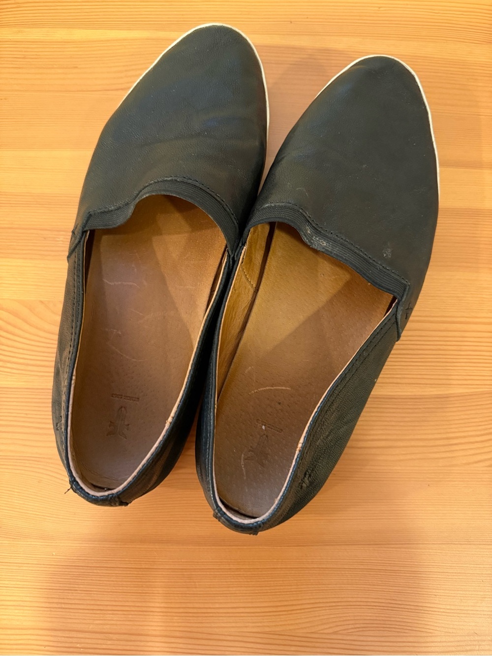 Frye Black Leather Slip-On Flats with Off-White Sole